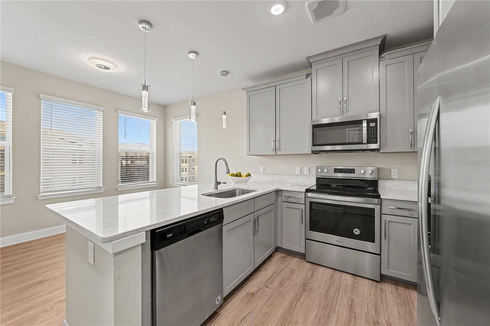 7505 LAUREATE BOULEVARD, #2407, Orlando, FL 32827 The heart of the home with streaming sunshine to enjoy