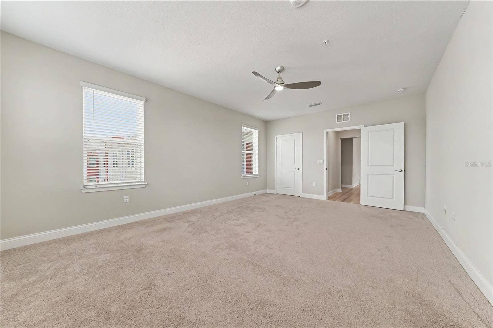 7505 LAUREATE BOULEVARD, #2407, Orlando, FL 32827 Primary Ensuite Bedroom with custom closet