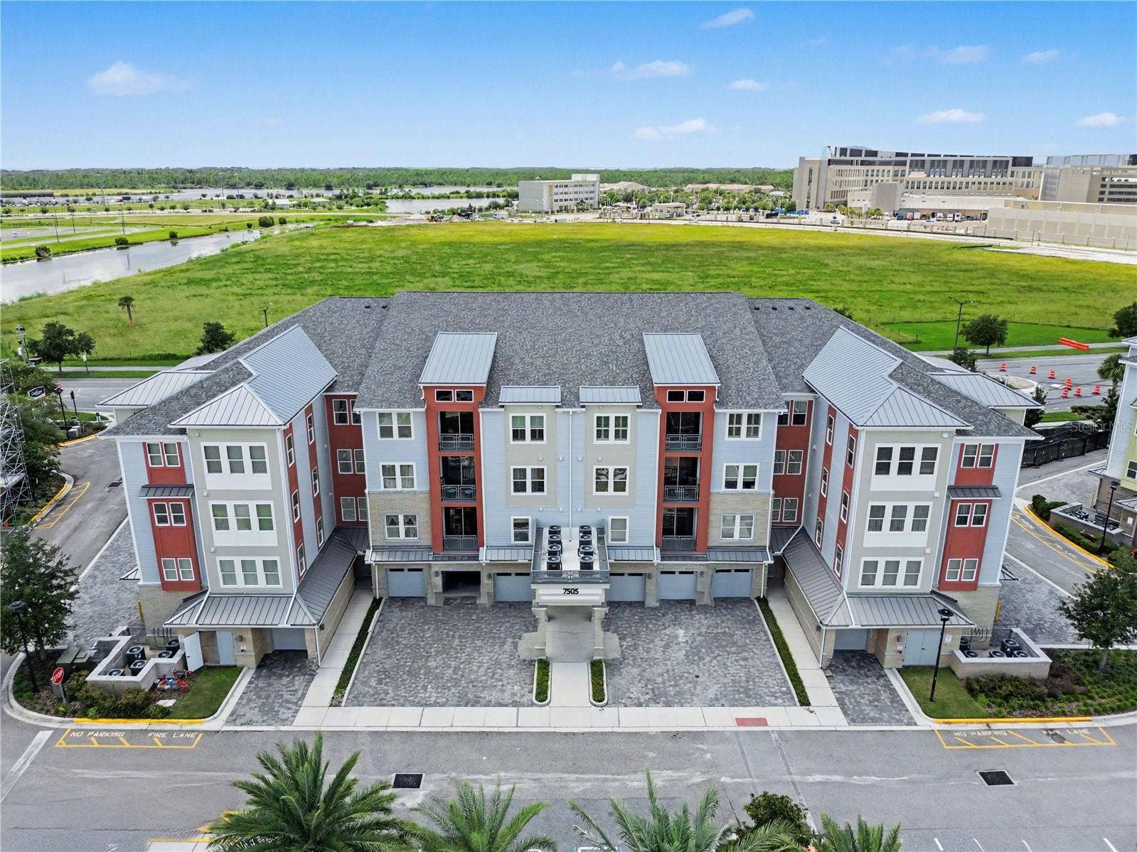 7505 LAUREATE BOULEVARD, #2407, Orlando, FL 32827 Building 7505 - Your private garage is on the right in the entrance building