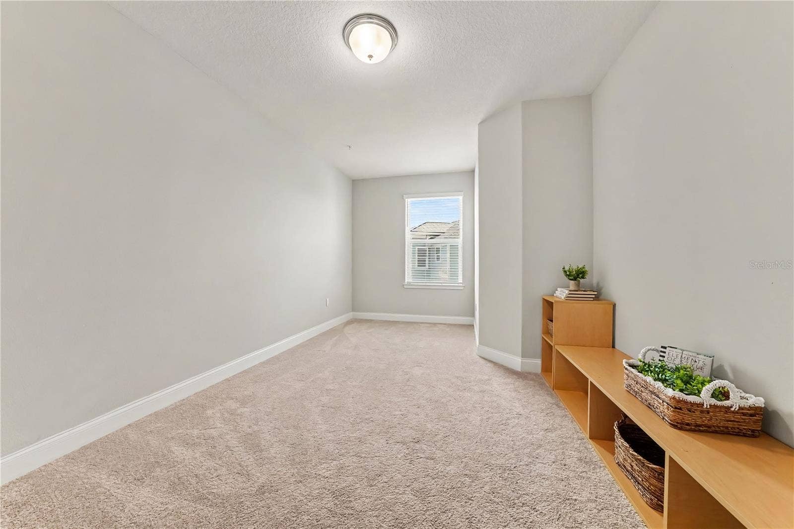 7505 LAUREATE BOULEVARD, #2407, Orlando, FL 32827 Bedroom #3 with built in bookcase/media center, closet, and window