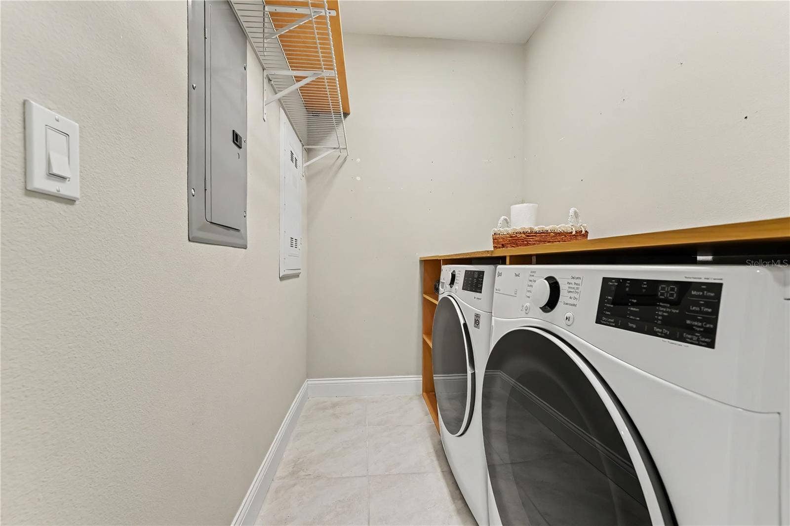 7505 LAUREATE BOULEVARD, #2407, Orlando, FL 32827 Laundry room with high end washer and dryer that convey