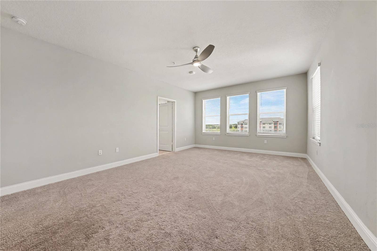 7505 LAUREATE BOULEVARD, #2407, Orlando, FL 32827 Huge primary ensuite bedroom with views of the pool and Clubhouse. Just walk across the street and you'll enjoy the many amenities The Gathering offers. Prime location!