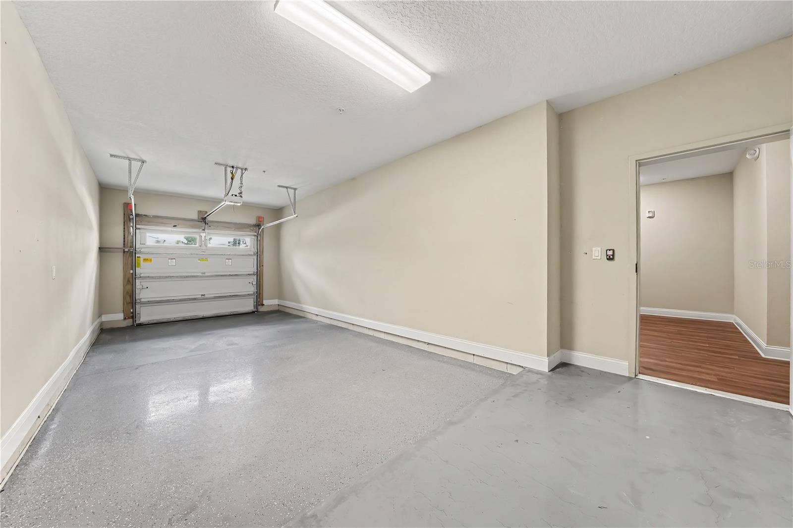 7505 LAUREATE BOULEVARD, #2407, Orlando, FL 32827 Private garage with entry to building/lobby/elevator