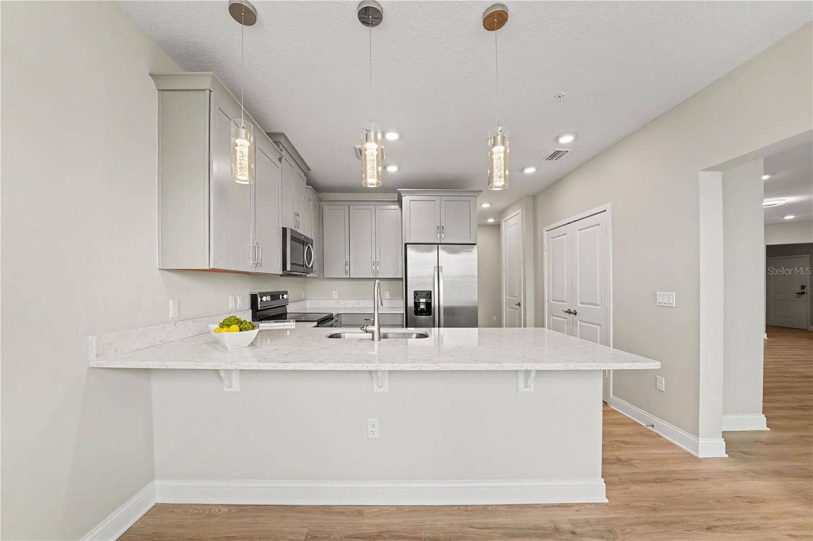 7505 LAUREATE BOULEVARD, #2407, Orlando, FL 32827 Freshly painted condo with neutral tones that compliment the cabinetry and counters