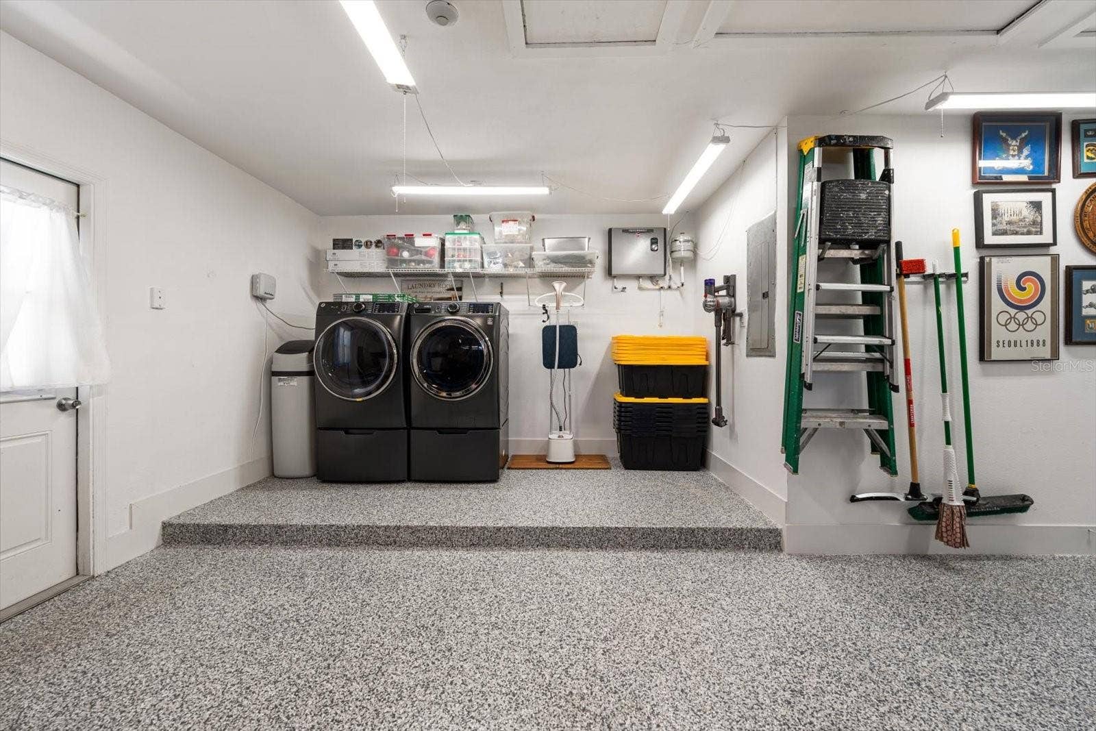 Plenty of space around the laundry with new washer/dryer and on demand water heater means you never run out of hot water!