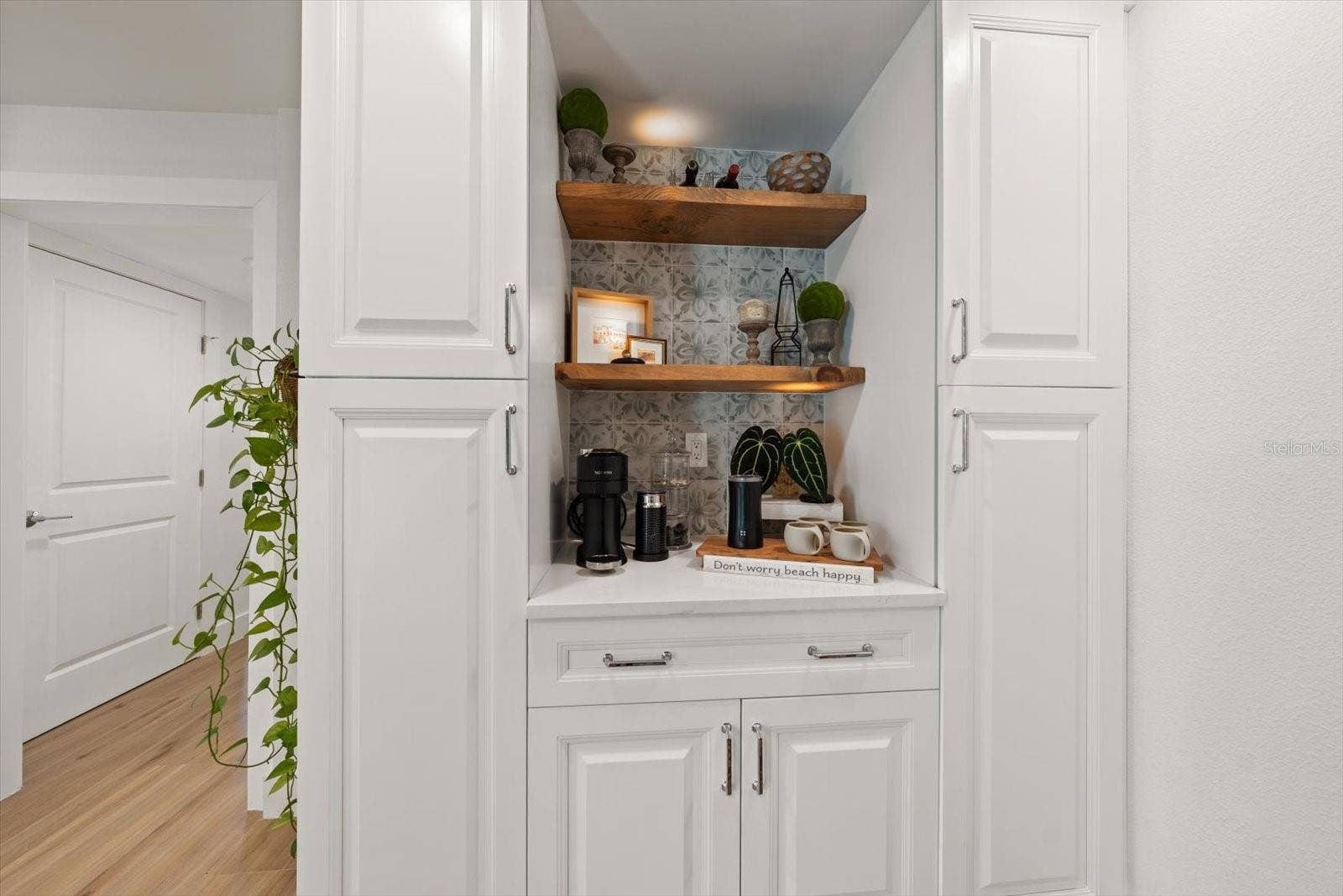 Built in cabinets make a great coffee bar.