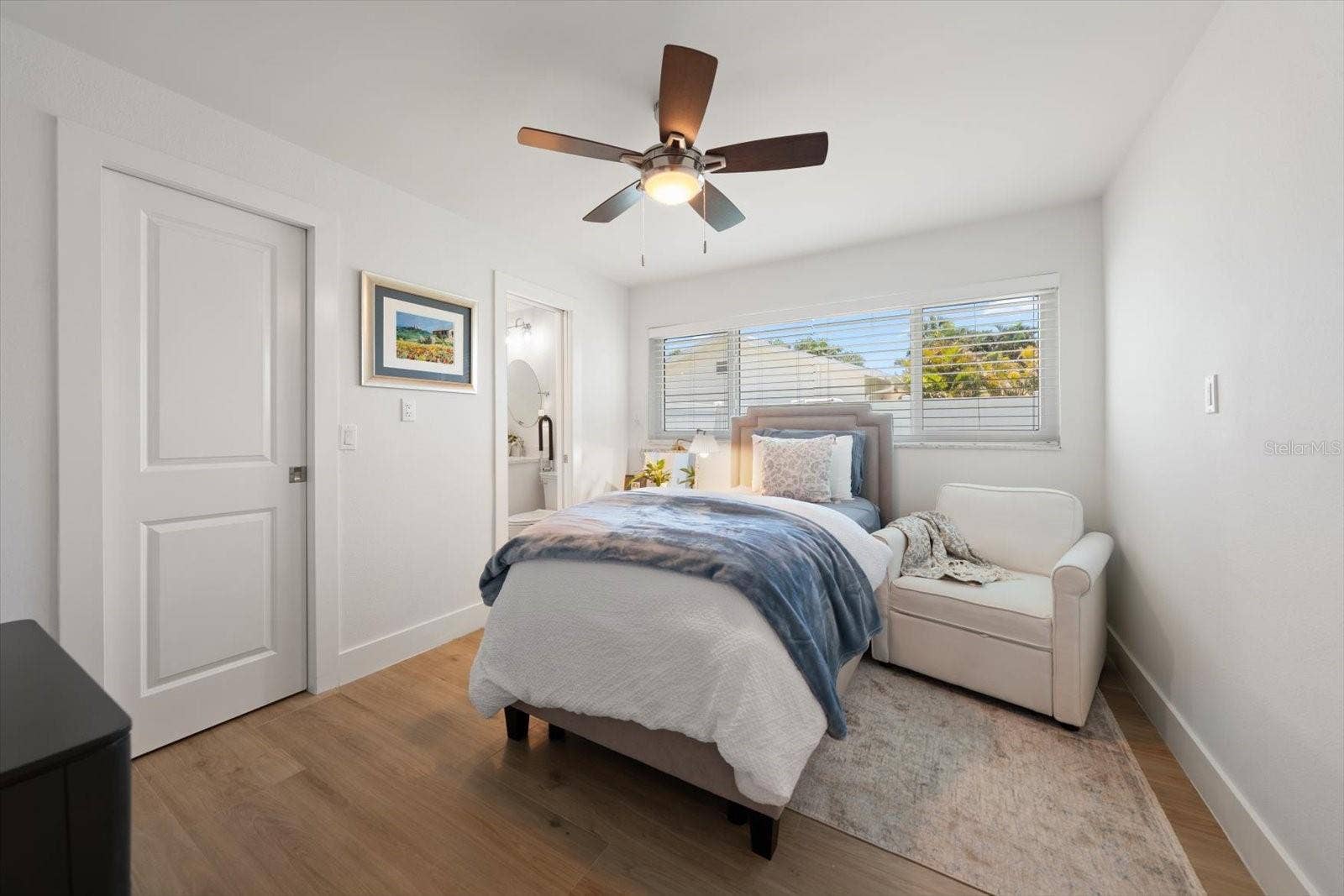 Bedroom #2 with an En-Suite Bath and a walk in closet.