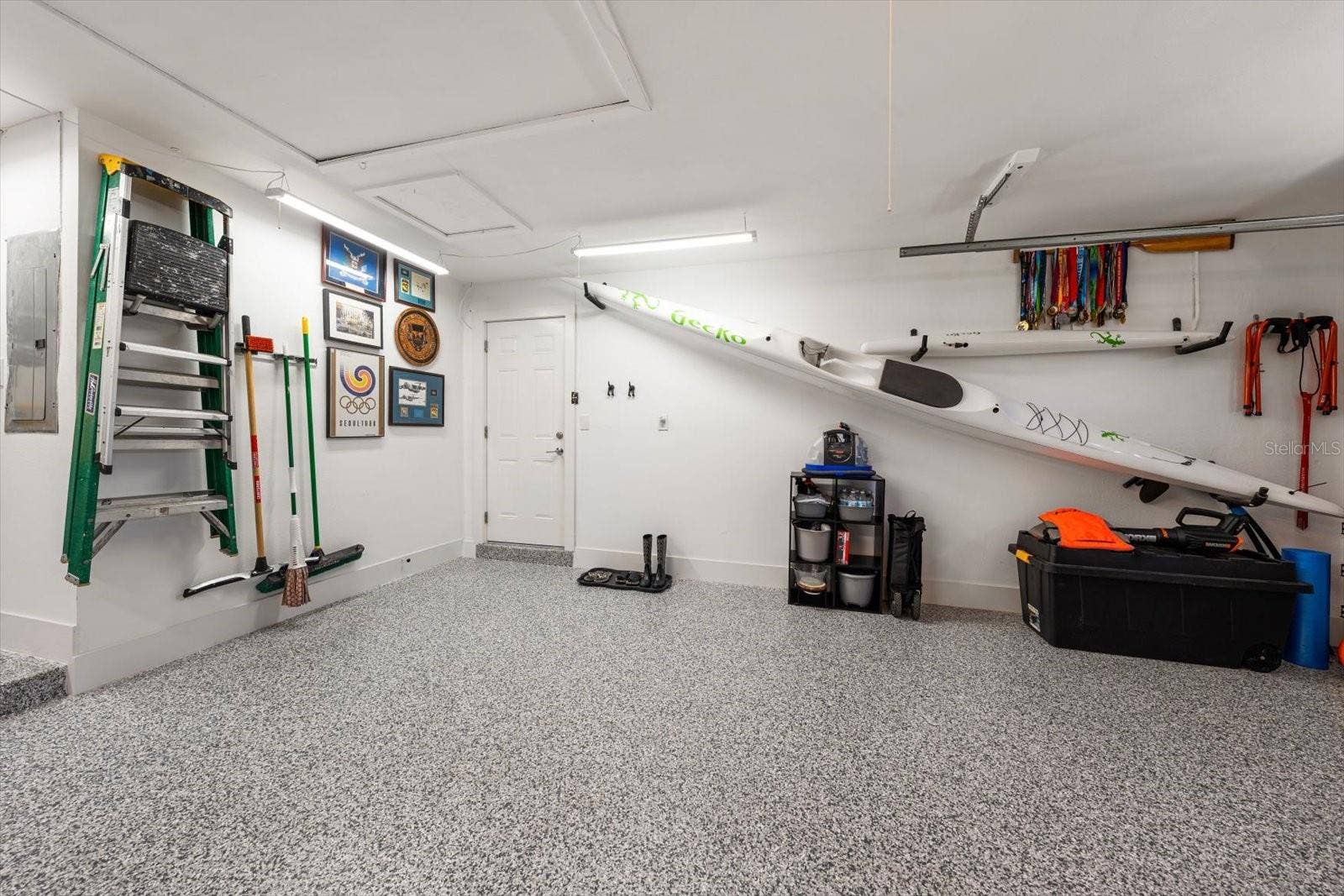 This oversized garage with it's beautiful floor.
