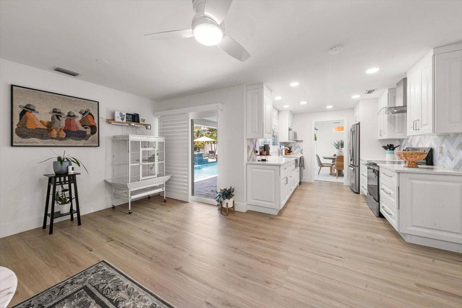 Great space off the kitchen with sliding glass doors to the Pool and Patio!
