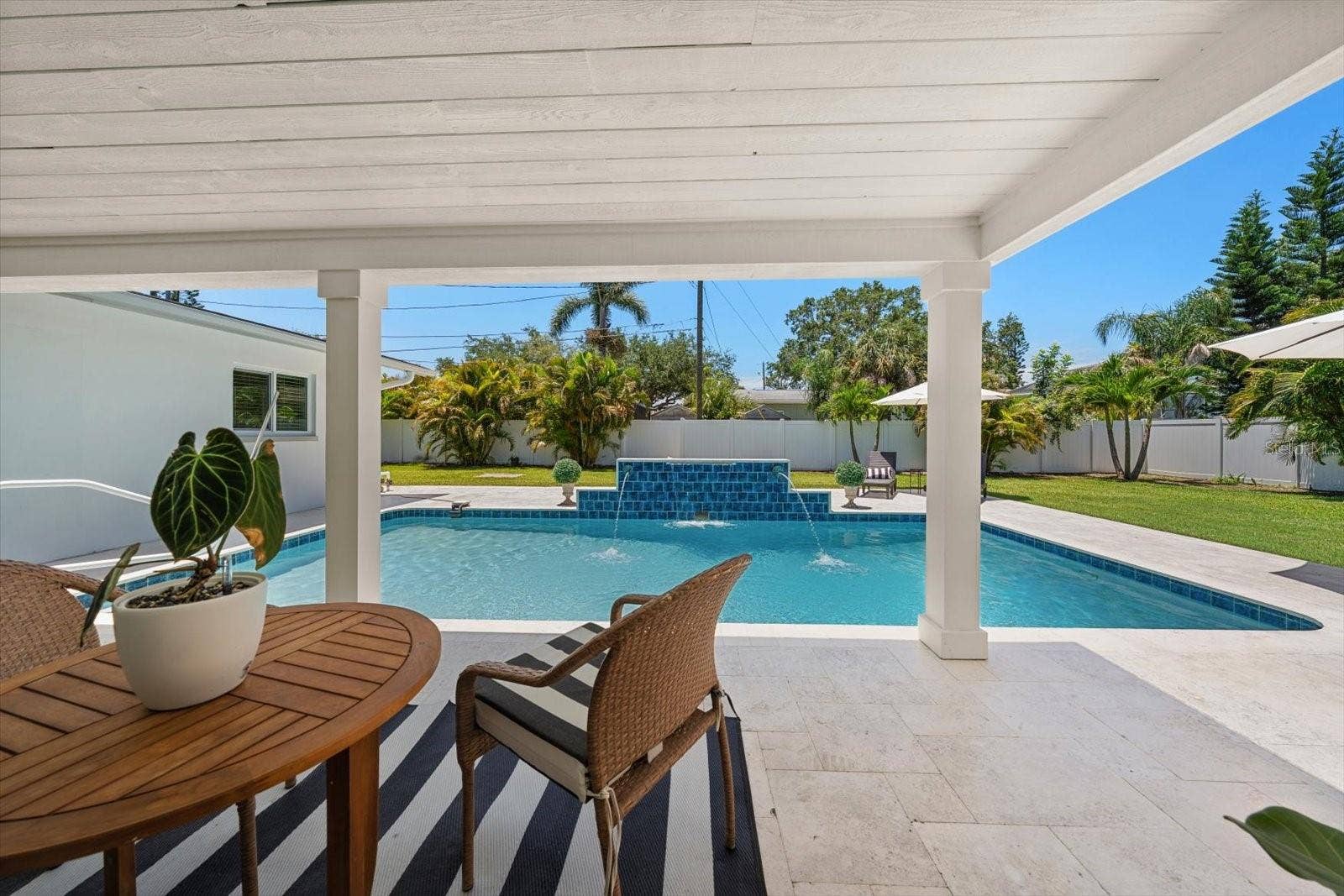 Entertaining or chilling, this covered patio will protect from the elements.