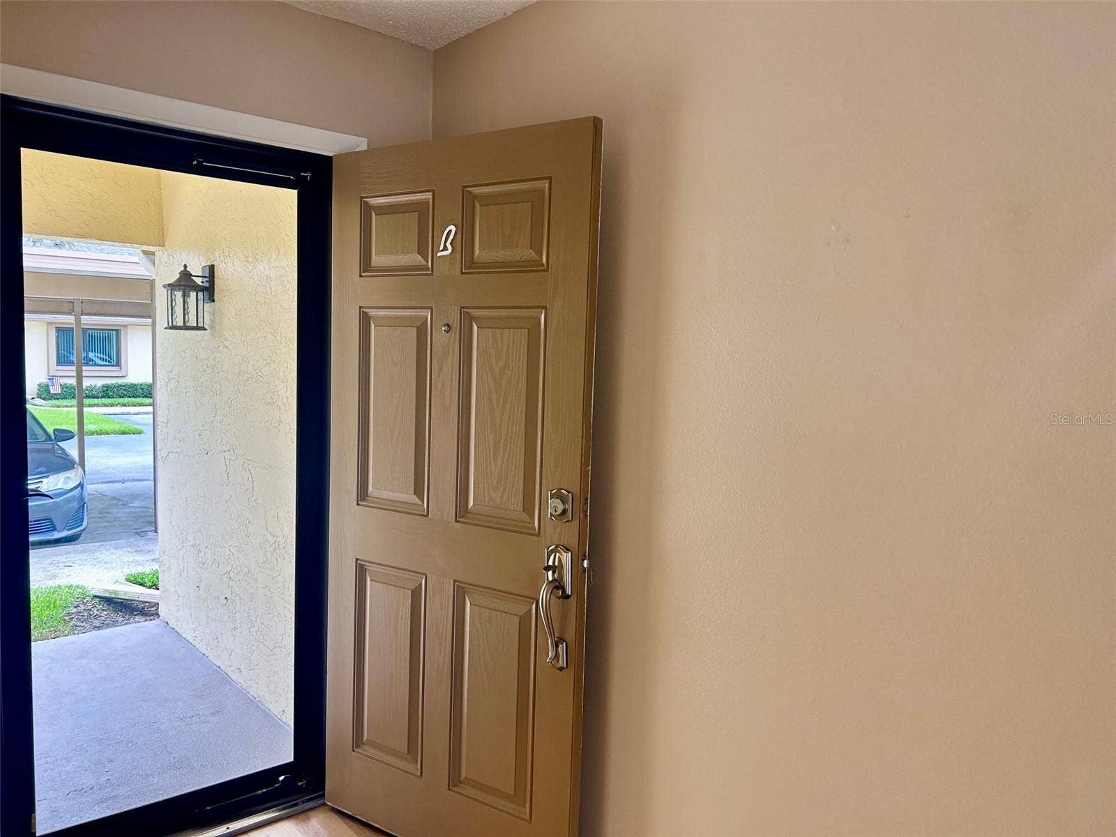 2506 OAKLEAF LANE, #25B, Clearwater, FL 33763 Front Door With Glass Door