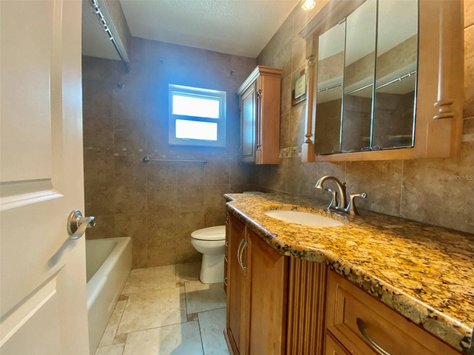 506 71ST AVENUE, #4, St Pete Beach, FL 33706 Bathroom between