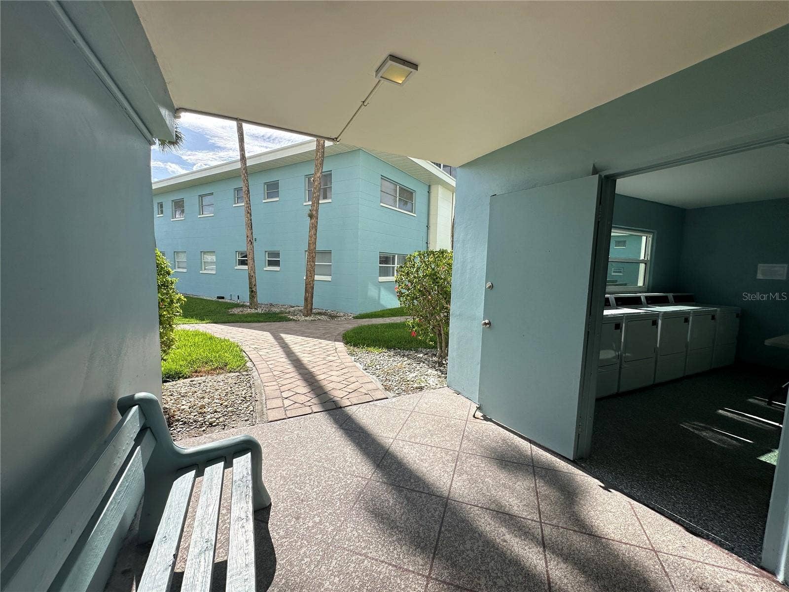6161 GULF WINDS DRIVE, #150, St Pete Beach, FL 33706 Pass the laundry pathe to the pool dock BBQ
