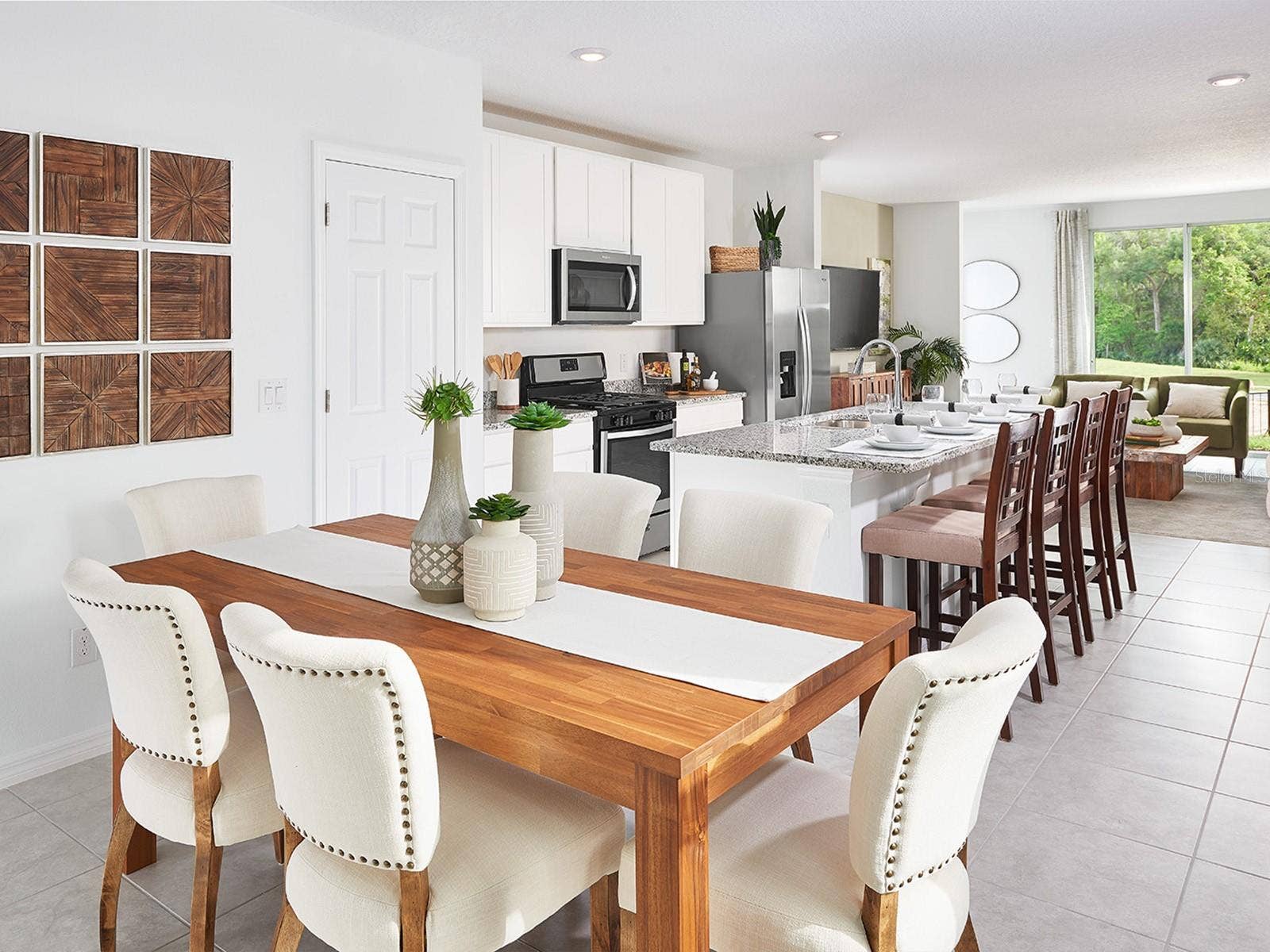 13610 SHELLMORE AVENUE, Palmetto, FL 34221 Photo is not of the actual home, but is an inspirational photo of builders model home and may depict options, furnishings, and/or decorator features that are not included.