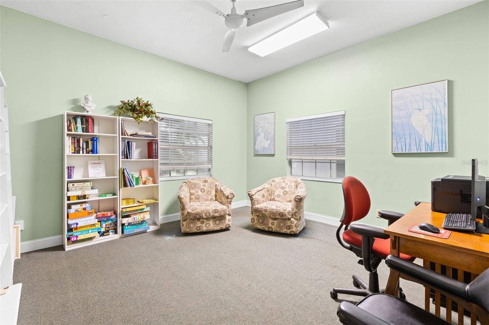 12760 INDIAN ROCKS ROAD, #107, Largo, FL 33774 A quieter corner of the clubhouse is set up as a library and computer room, with books, games, comfortable seating and a workstation available for community use.