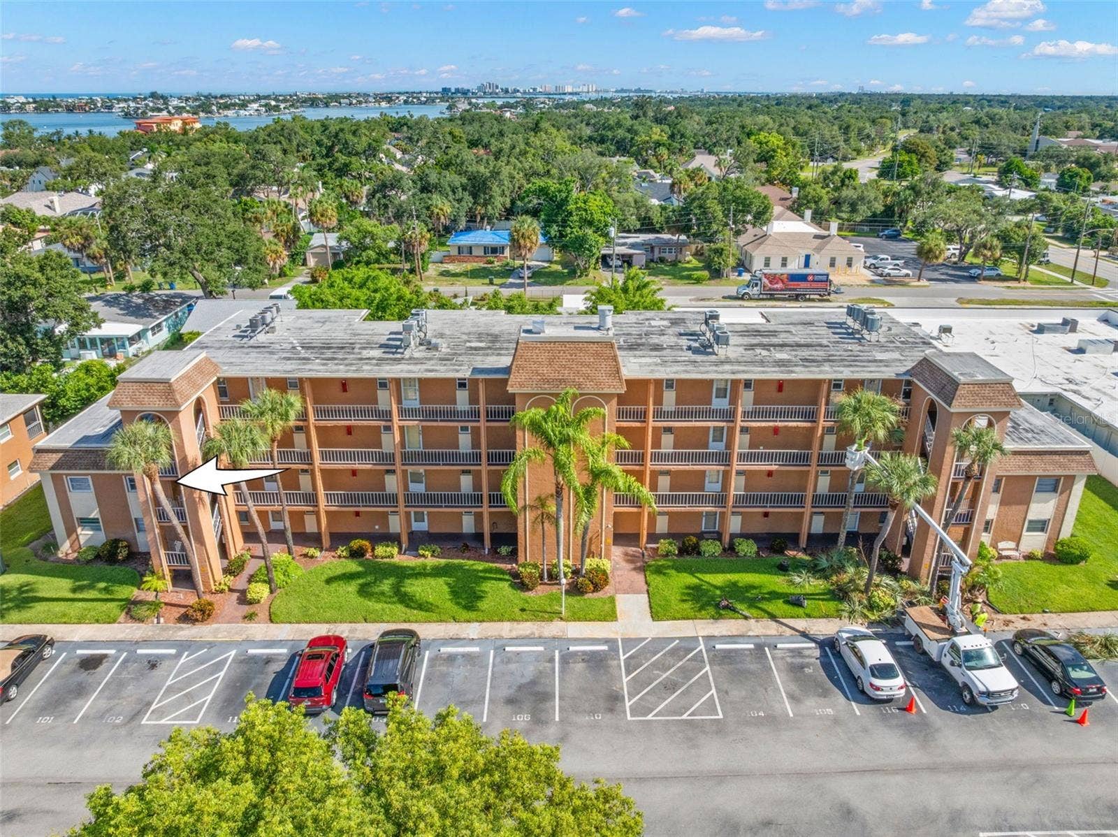 12760 INDIAN ROCKS ROAD, #107, Largo, FL 33774 Positioned at the end of the building 1, the 2-bedroom condo benefits from an end-unit location, with mature landscaping surrounding the community.
