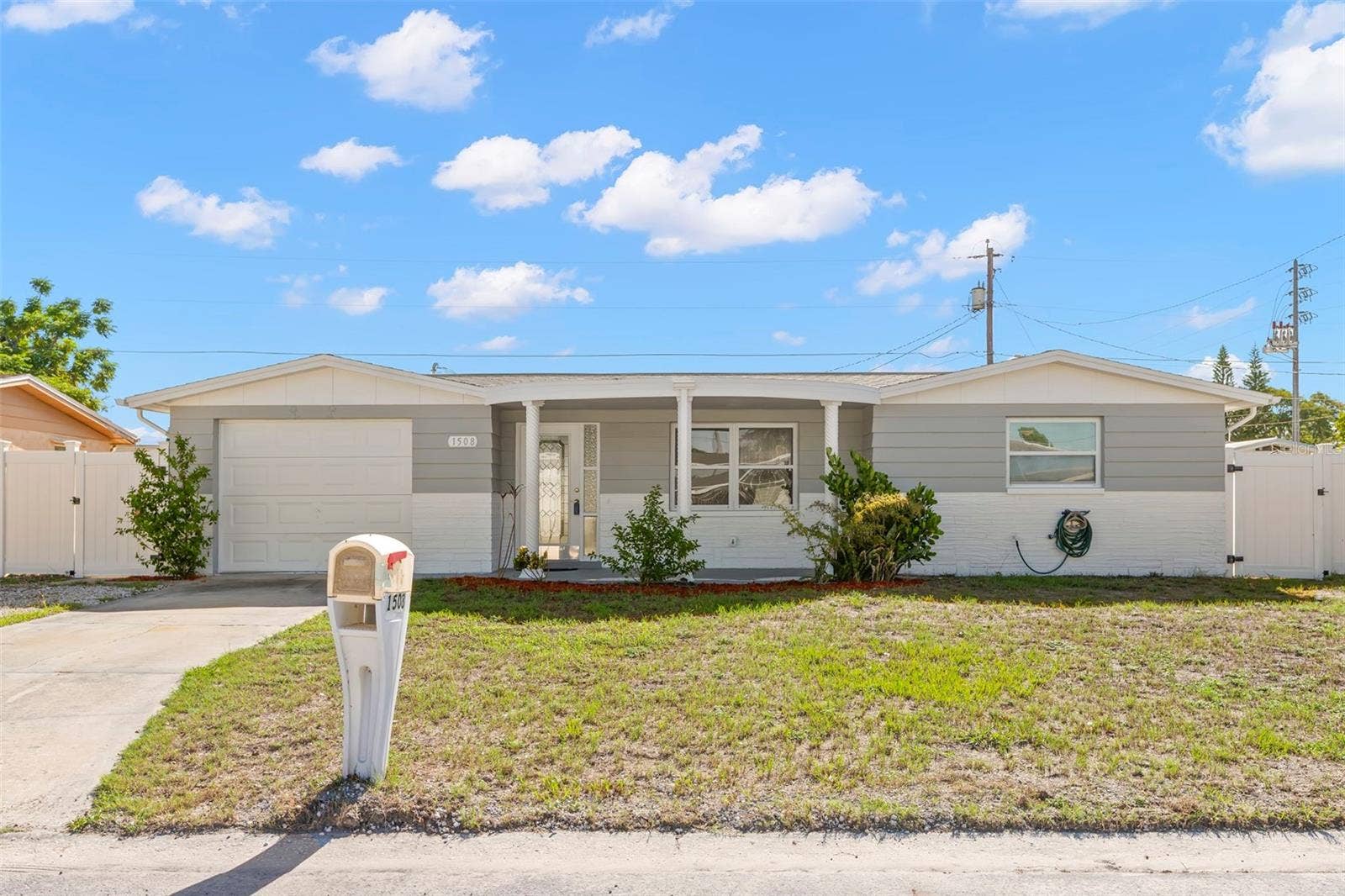 1508 DERRICK STREET, Holiday, FL 34690 Front with driveway