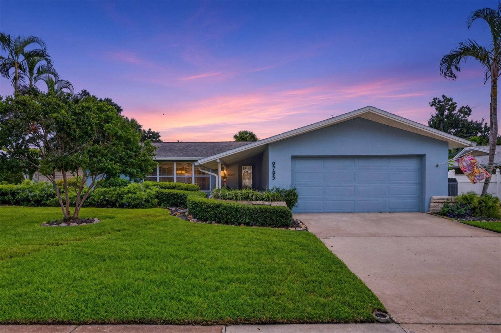 9795 PORTSIDE DRIVE, Seminole, FL 33776 House at Twilight