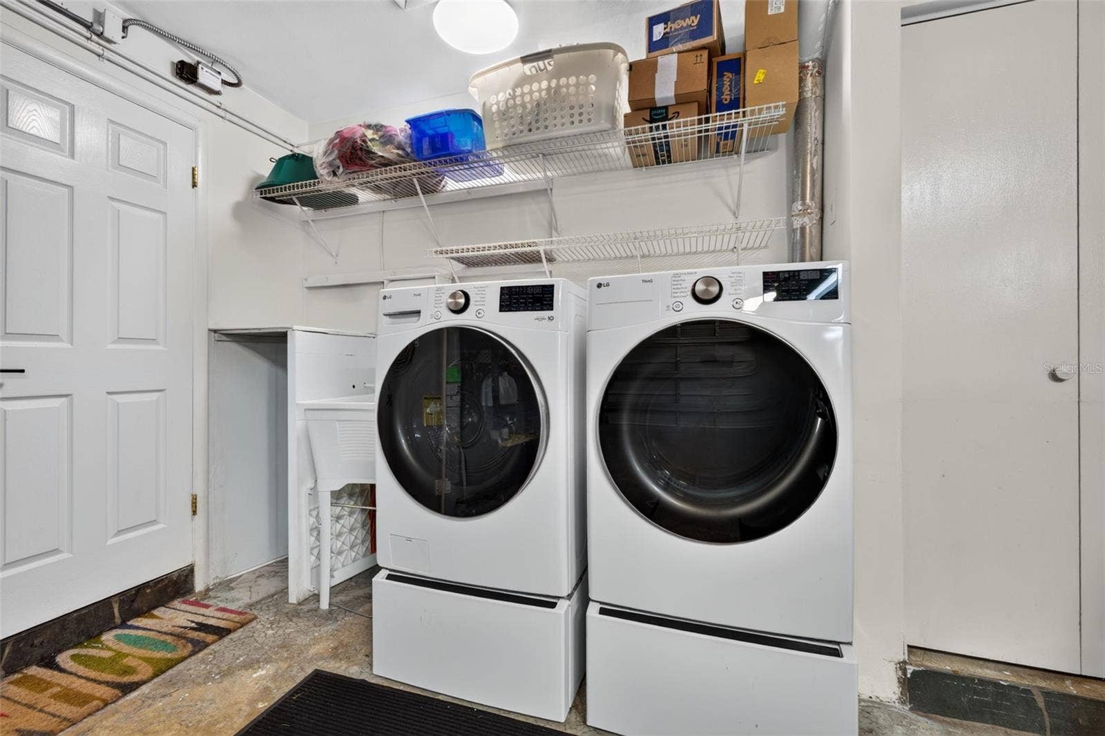 9795 PORTSIDE DRIVE, Seminole, FL 33776 Washer and Dryer in Garage