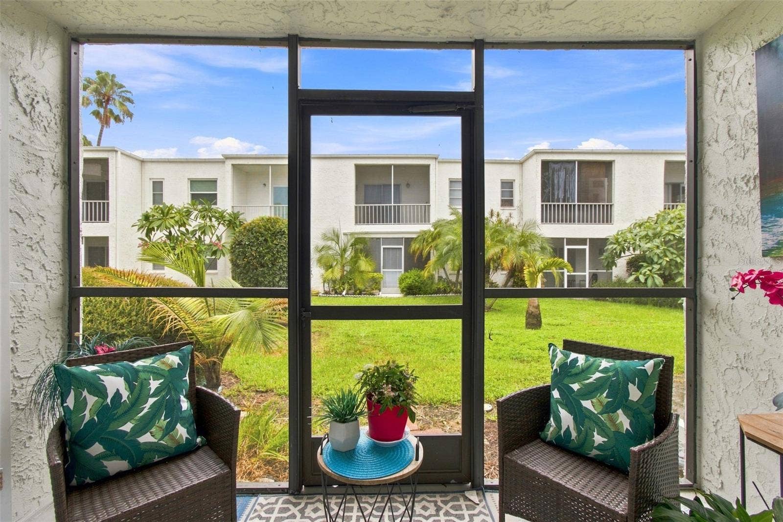 217 S MCMULLEN BOOTH ROAD, #179, Clearwater, FL 33759 Covered/Screened Lanai with view of courtyard