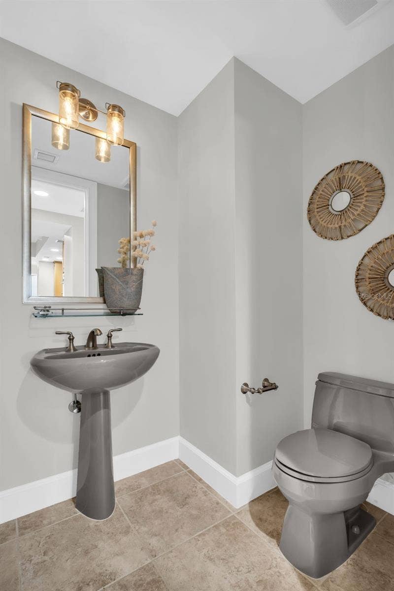300 BEACH DRIVE NE, #2604, St Petersburg, FL 33701 Guest Half-Bath in Main Living Area