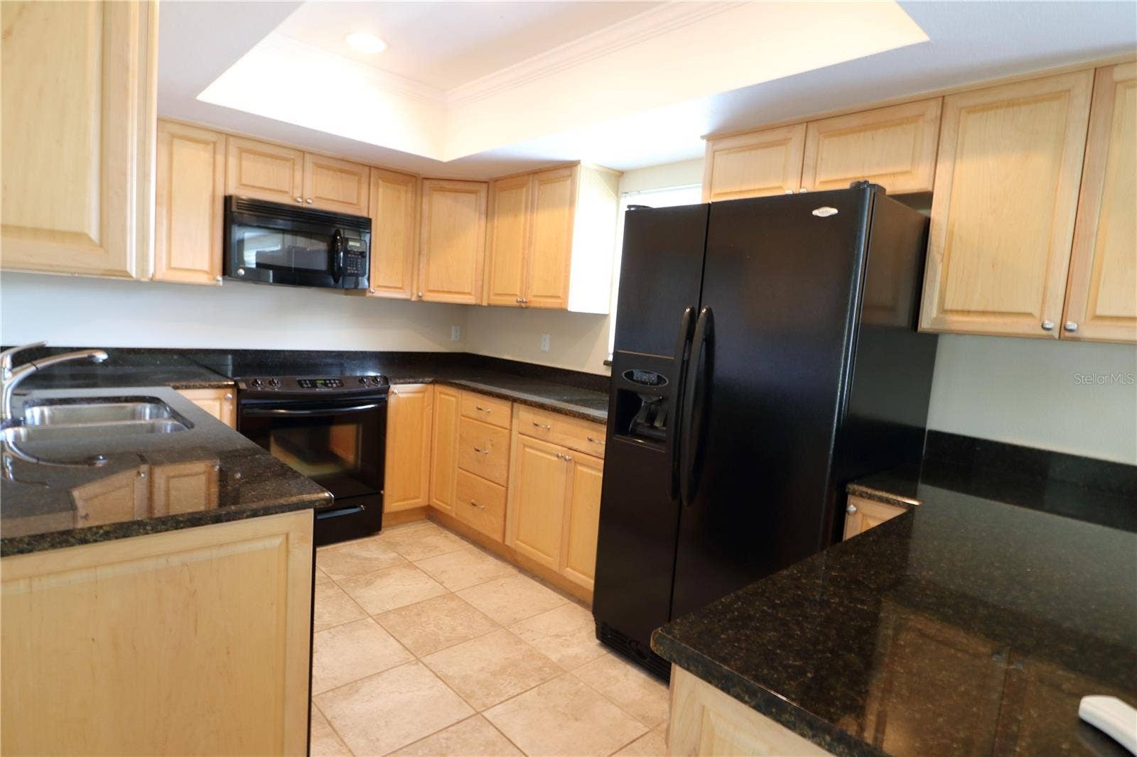Kitchen with Maple Cabinets & Granite Counter surfaces