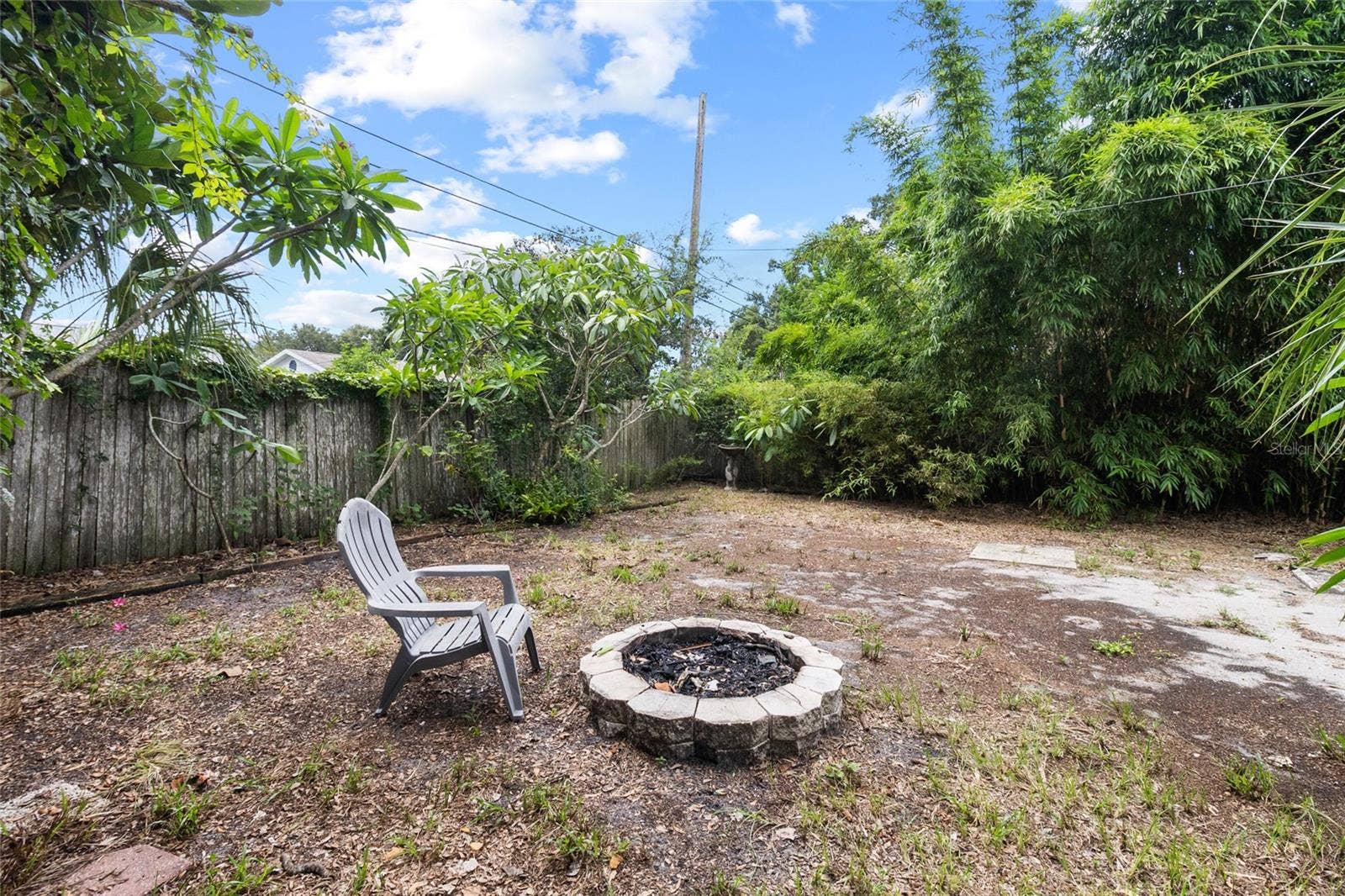 5410 14TH AVENUE S, Gulfport, FL 33707 spacious fenced yard with firepit!