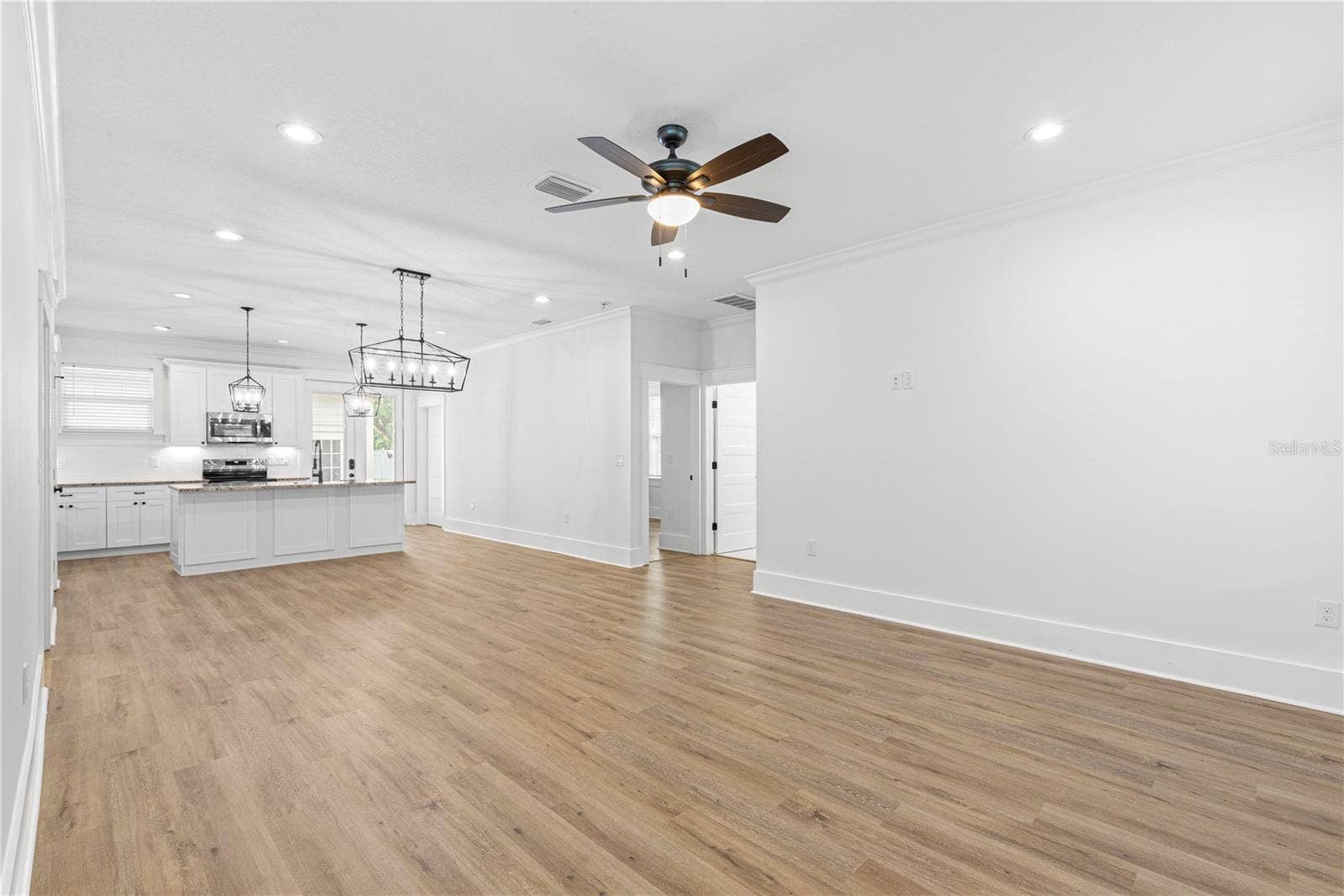 The view as soon as you walk in the front door (Living Room, Dining Room, Kitchen)