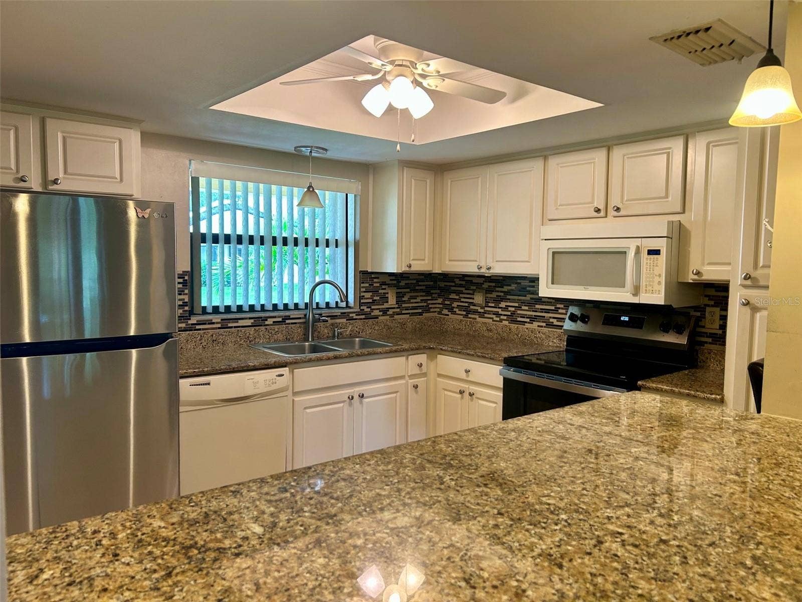 2529 OAKLEAF LANE, #30C, Clearwater, FL 33763 Kitchen With Granite Countertops