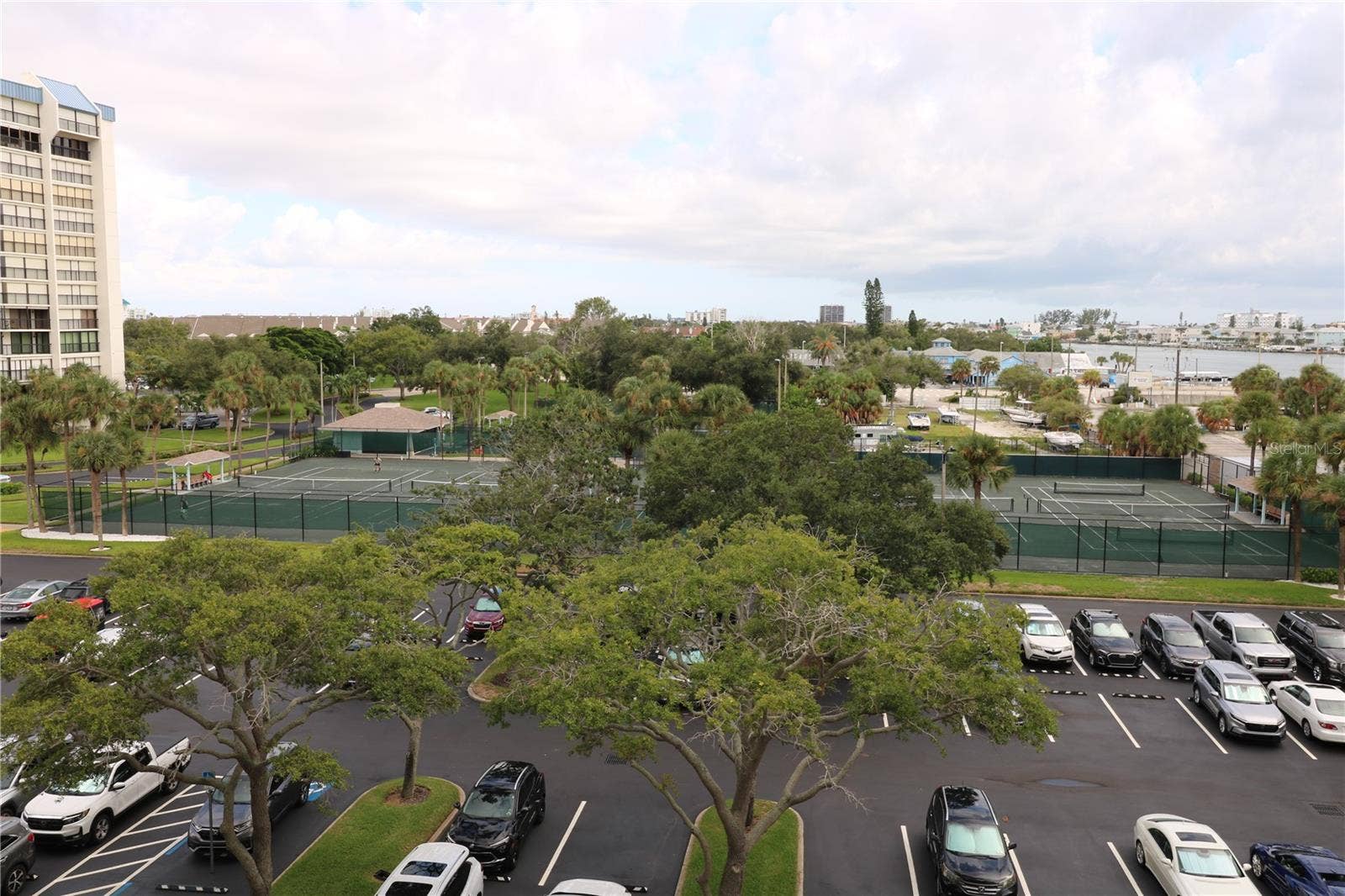 9495 BLIND PASS ROAD, #504, St Pete Beach, FL 33706 Tennis courts from 5th floor