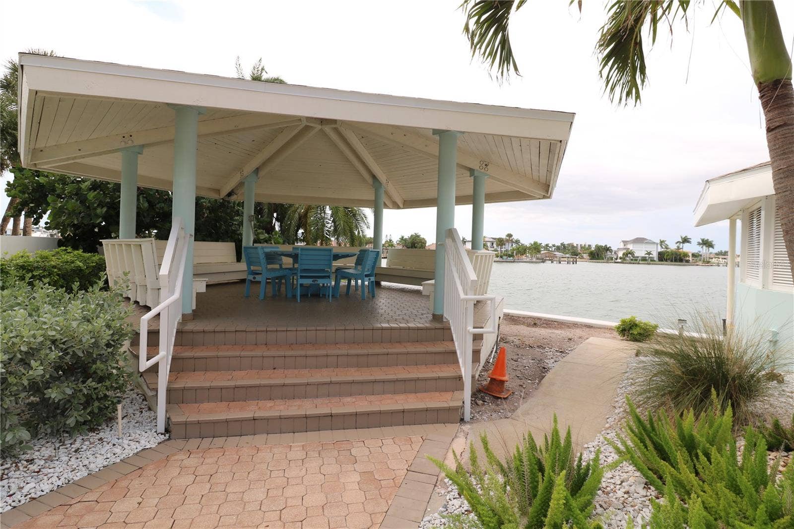 9495 BLIND PASS ROAD, #504, St Pete Beach, FL 33706 Community sitting area on the water