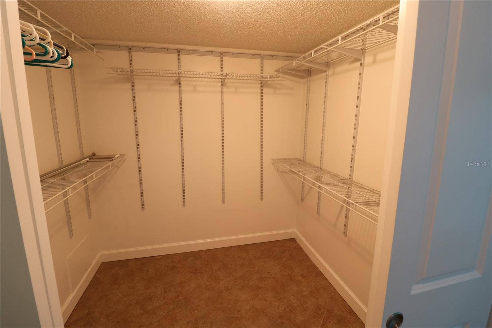 9495 BLIND PASS ROAD, #504, St Pete Beach, FL 33706 Primary bedroom walk in closet