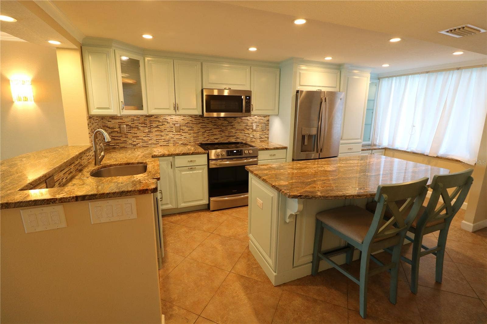 9495 BLIND PASS ROAD, #504, St Pete Beach, FL 33706 Large kitchen with quality cabinets and granite counters