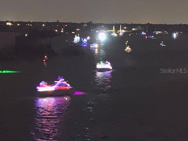 9495 BLIND PASS ROAD, #504, St Pete Beach, FL 33706 balcony watching boat parade