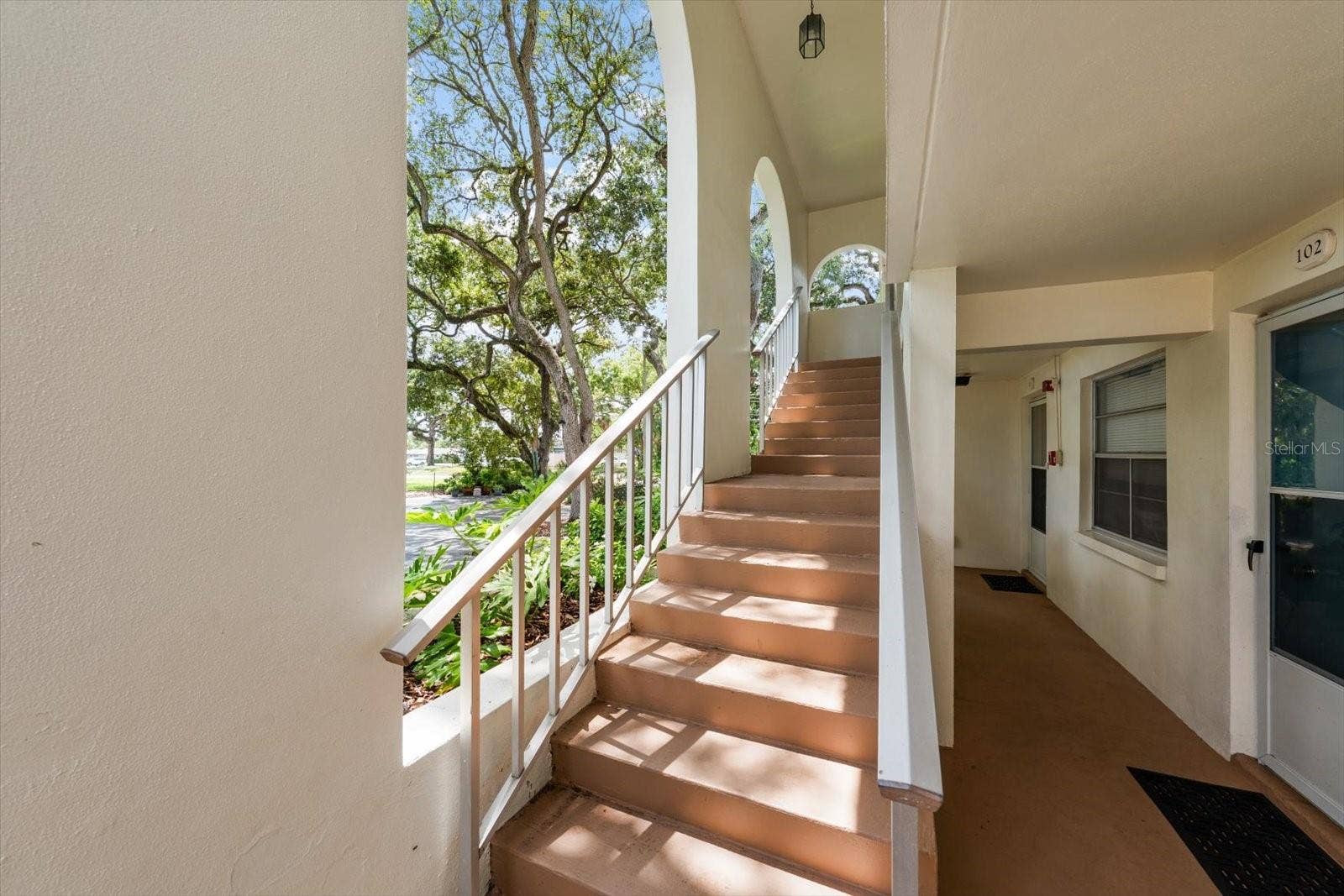 1975 W BAY DRIVE, #109, Largo, FL 33770 Stairs to 2nd floor end unit