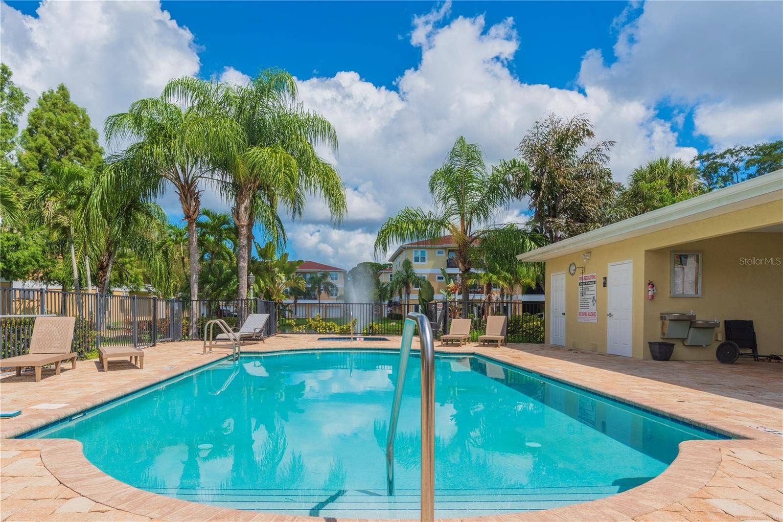 5065 ROYAL PALMS WAY, #303, New Port Richey, FL 34652 Community pool.