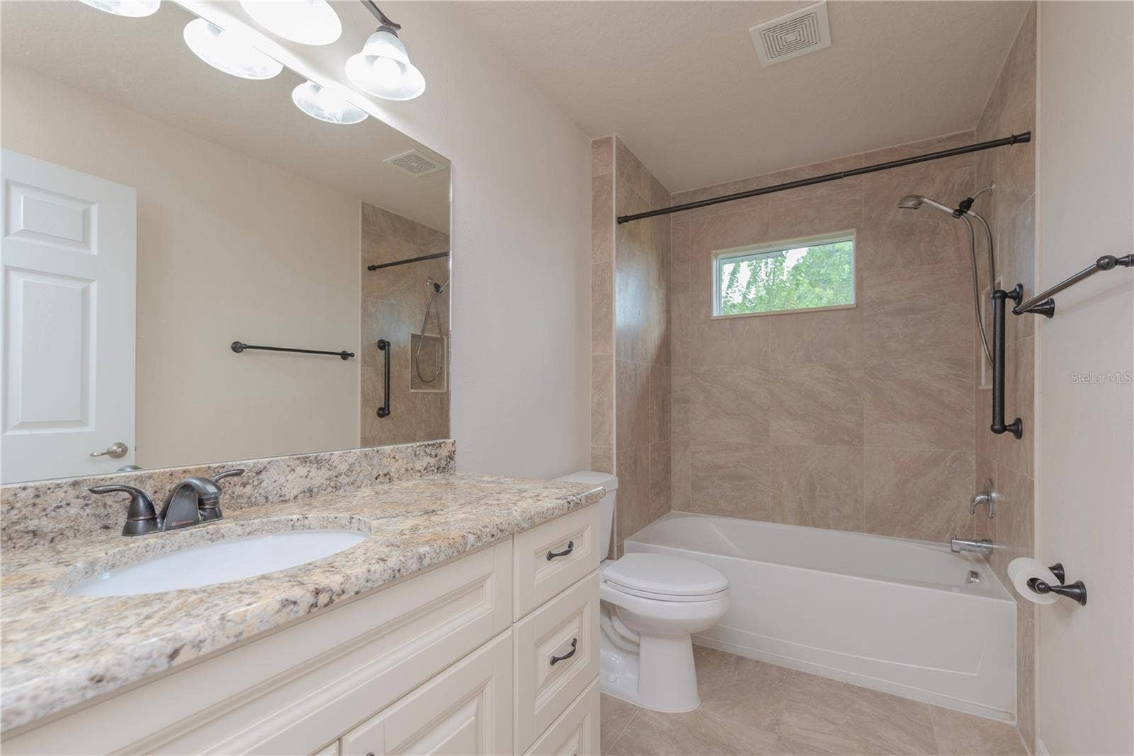 5065 ROYAL PALMS WAY, #303, New Port Richey, FL 34652 Guest bathroom.