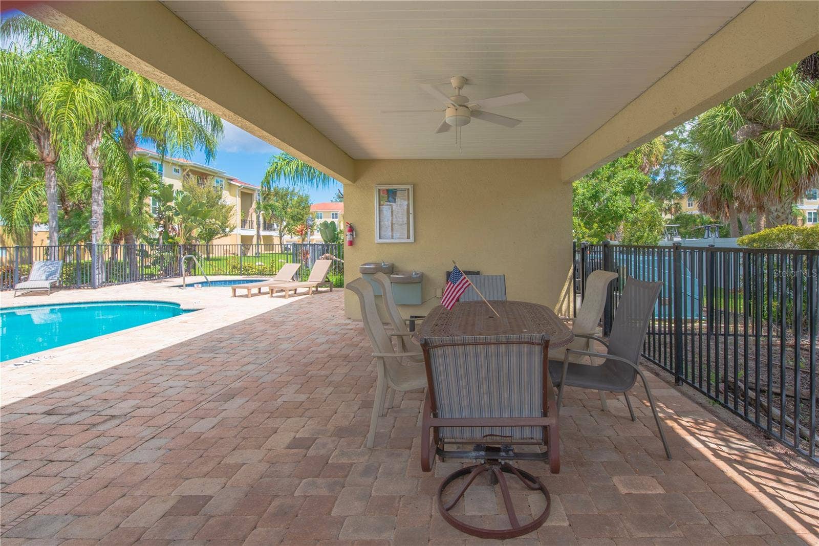 5065 ROYAL PALMS WAY, #303, New Port Richey, FL 34652 Covered area by the pool.