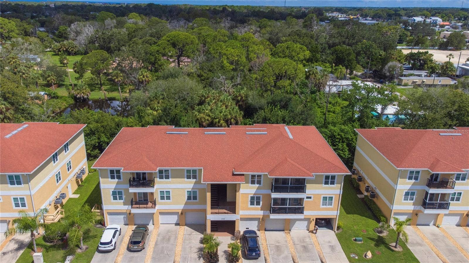 5065 ROYAL PALMS WAY, #303, New Port Richey, FL 34652 Aerial view of building 5065.
