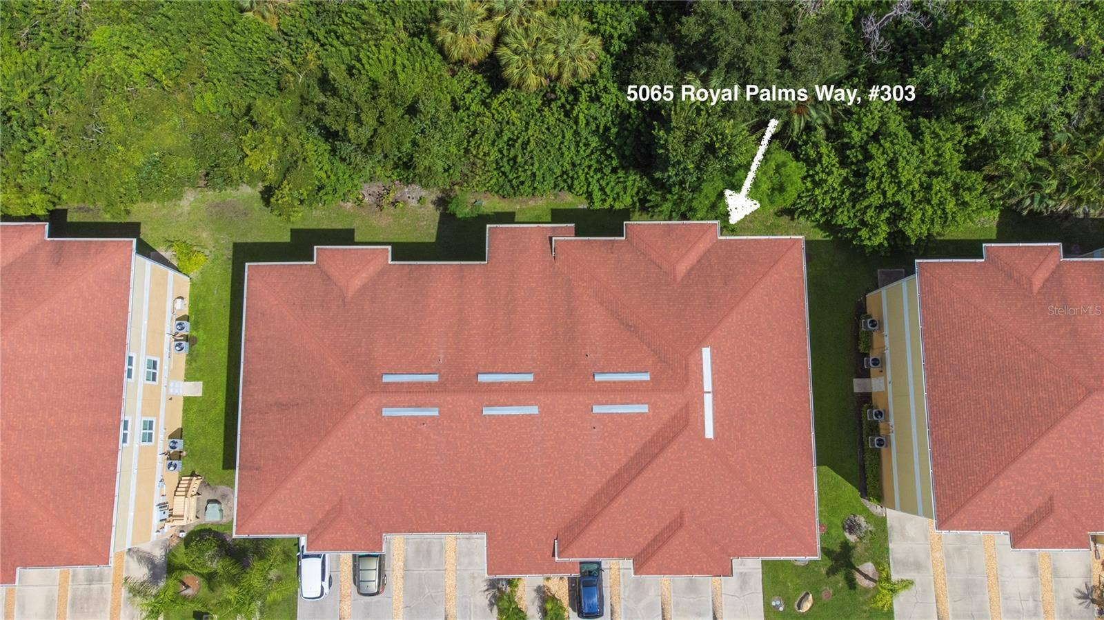 5065 ROYAL PALMS WAY, #303, New Port Richey, FL 34652 Top floor, right rear corner, overlooking trees.