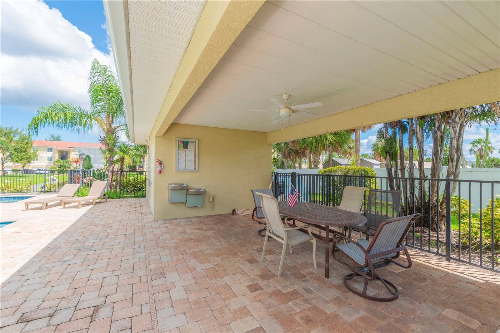 5065 ROYAL PALMS WAY, #303, New Port Richey, FL 34652 Covered area by the pool.