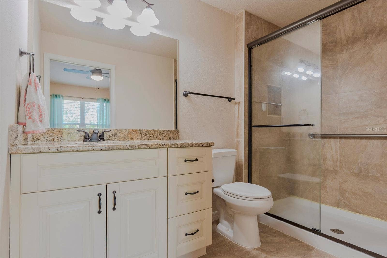 5065 ROYAL PALMS WAY, #303, New Port Richey, FL 34652 Primary ensuite bathroom.