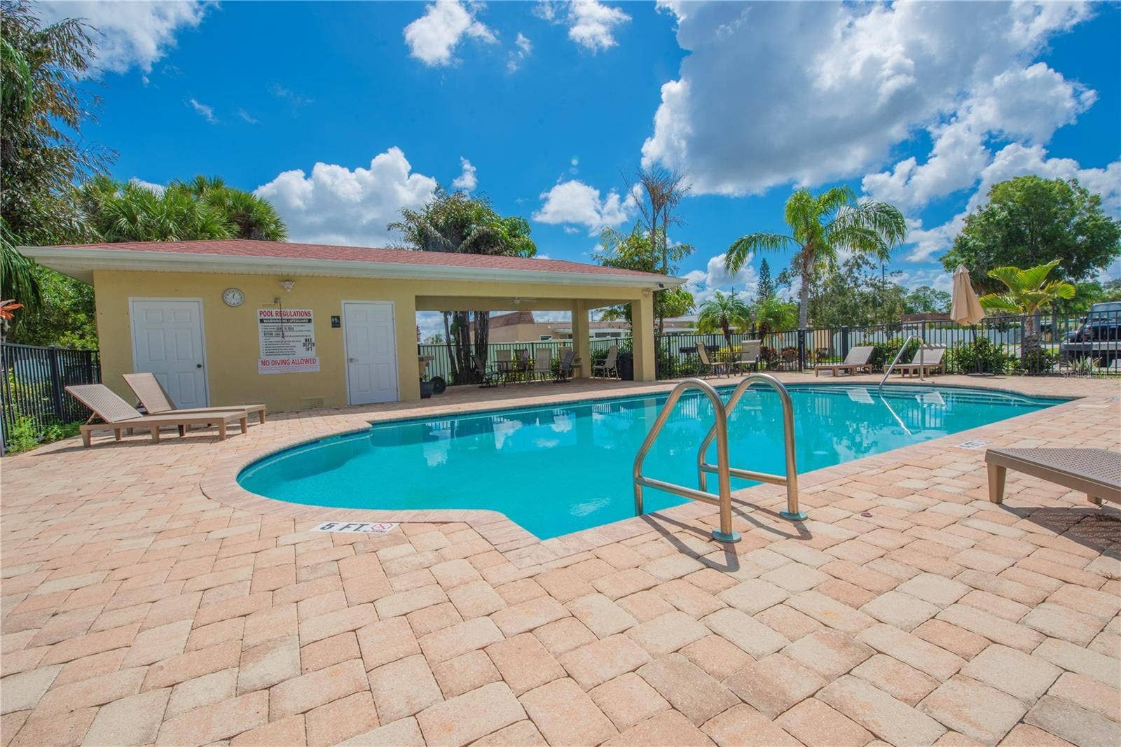 5065 ROYAL PALMS WAY, #303, New Port Richey, FL 34652 Community pool and spa.