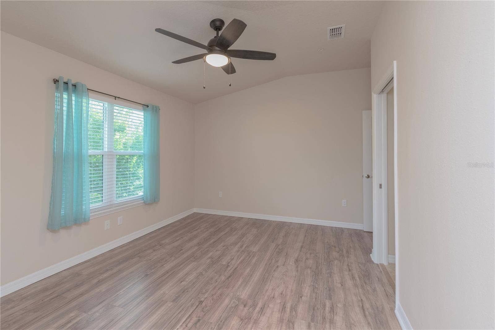5065 ROYAL PALMS WAY, #303, New Port Richey, FL 34652 Primary bedroom has walk-in closet.