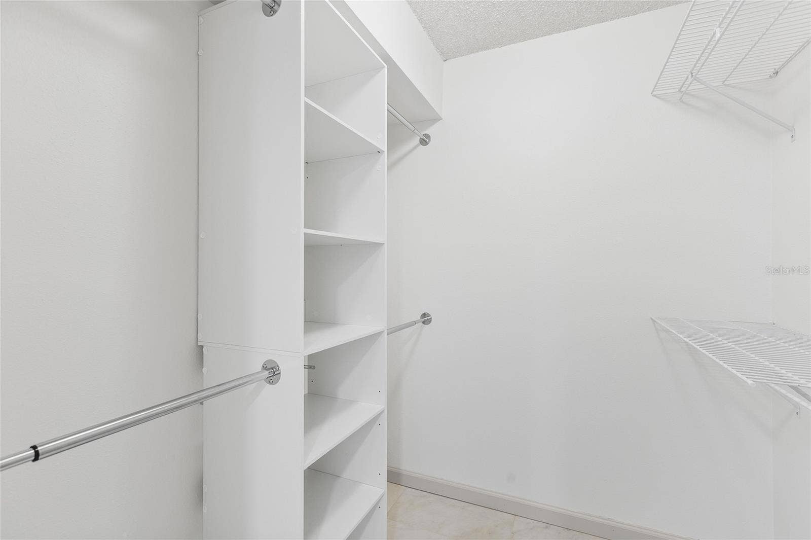 13626 GREENFIELD DRIVE, #109, Tampa, FL 33618 Primary Suite Walk-In Closet