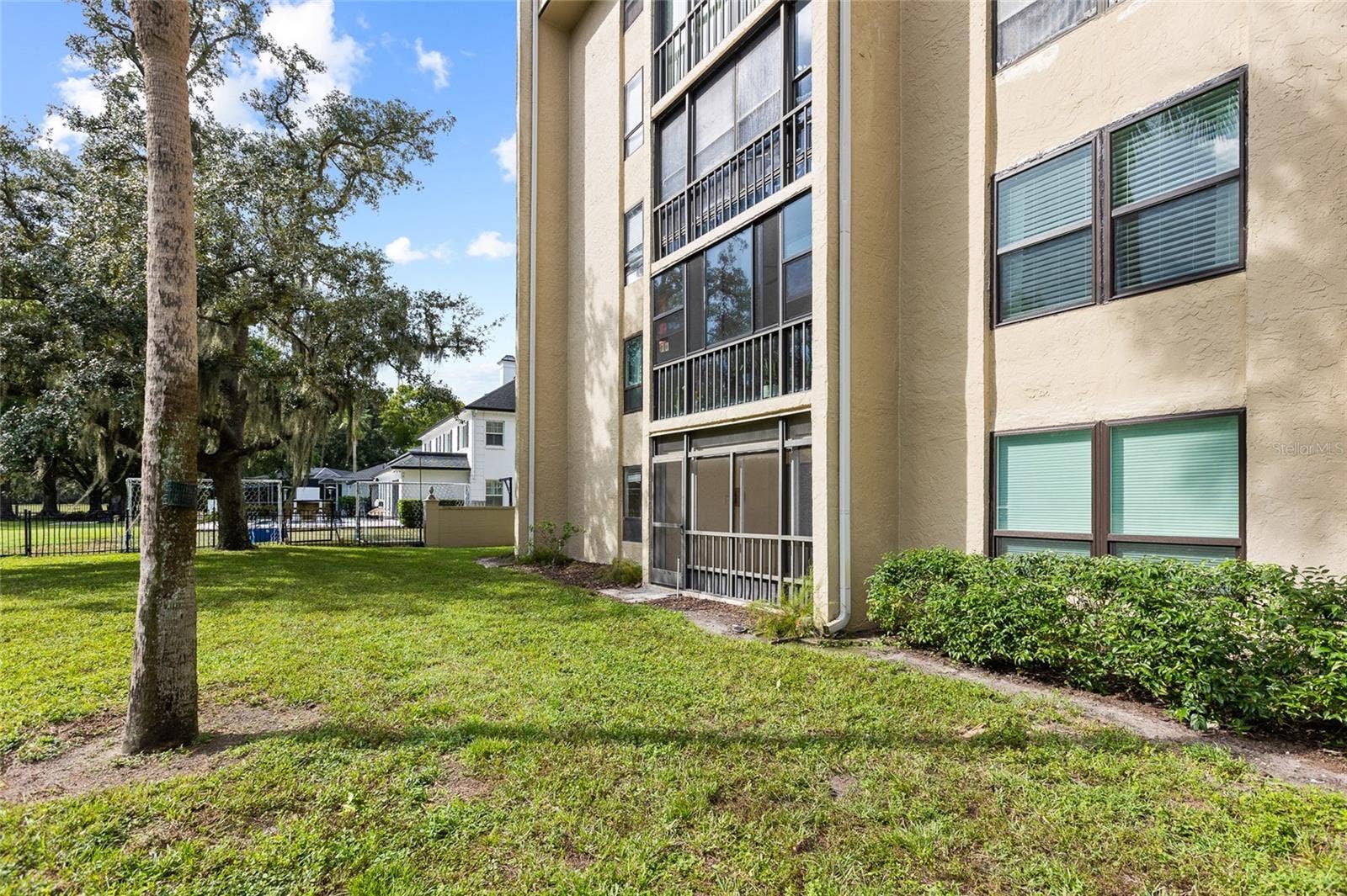 13626 GREENFIELD DRIVE, #109, Tampa, FL 33618 Building Exterior - Lanai