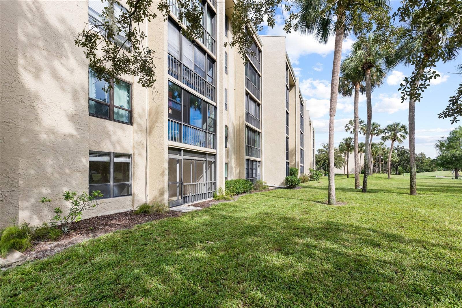 13626 GREENFIELD DRIVE, #109, Tampa, FL 33618 Building Exterior - Lanai Overlooking Golf Course