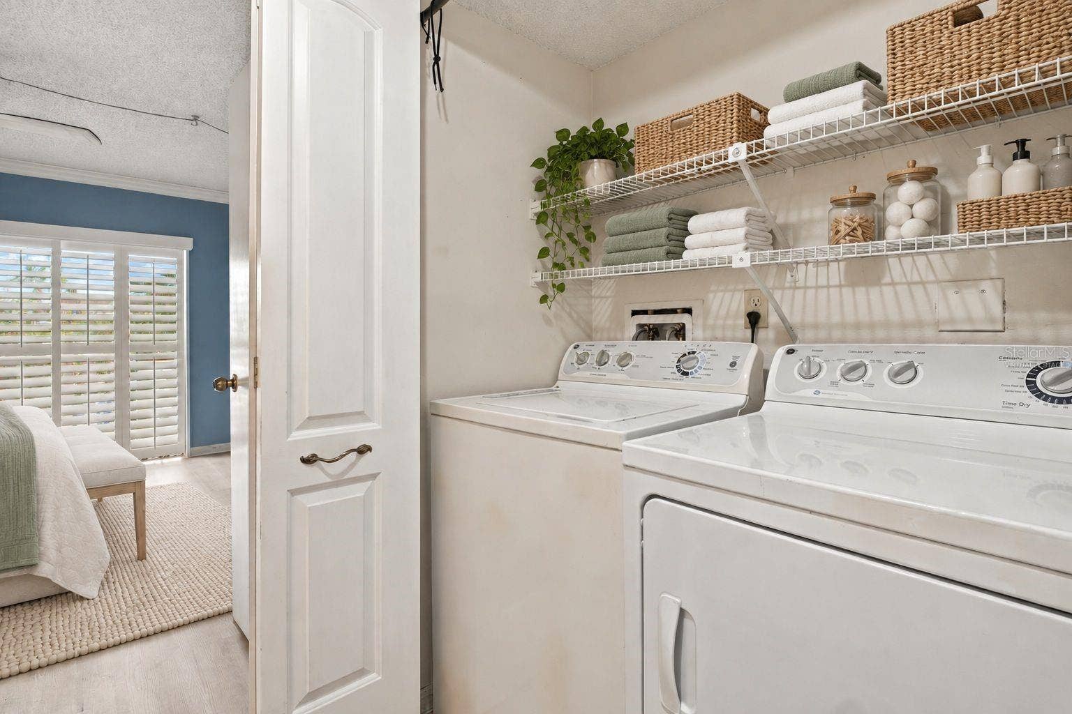 Virtually staged Laundry closet