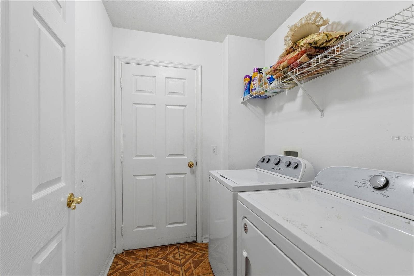566 VINEYARD WAY, Poinciana, FL 34759 interior Laundry Room