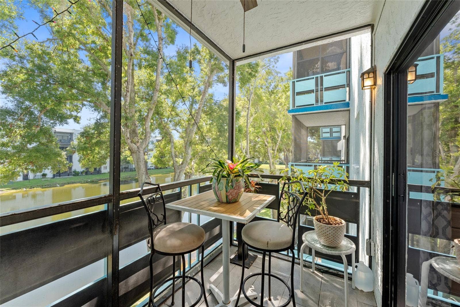 5970 80TH STREET N, #309, St Petersburg, FL 33709 Your screened lanai has an eastern exposure for morning sun,you are in the perfect location in the building to enjoy the pond views with the soothing fountain
